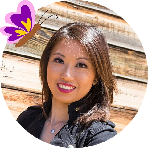 Tammy Co, smiling, with a purple butterfly illustration beside her.