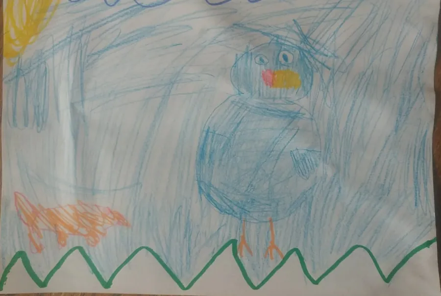 A child&rsquo;s crayon drawing of a blue dodo and an orange lizard under a yellow sun.